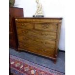 A 19th C. MAHOGANY CHEST OF TWO SHORT AND THREE GRADED LONG DRAWERS ON SHAPED BRACKET FEET,