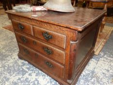 AN 18th C. OAK COFFER, THE FRONT WITH TWO FALSE SHORT AND TWO LONG DRAWERS ABOVE BRACKET FEET. W