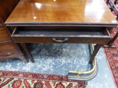 A GEORGE III MAHOGANY FOLD OVER TEA TABLE WITH FRIEZE DRAWER.