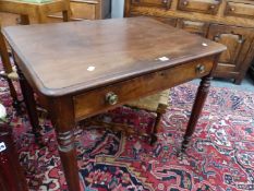 AN EARLY VICTORIAN MAHOGANY TABLE, THE SINGLE DRAWER DIVIDED INTO COMPARTMENTS, THE TAPERING