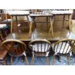 AN ERCOL ELM DINING TABLE TOGETHER WITH SIX HOOP BACK CHAIRS AND A FURTHER SET OF FOUR RAIL TOP HIGH