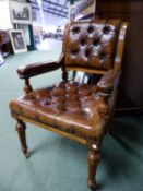 A 19th C. OAK ELBOW CHAIR, THE BACK AND SEAT BUTTON UPHOLSTERED IN LEATHER, THE FLUTED TAPERING
