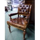 A 19th C. OAK ELBOW CHAIR, THE BACK AND SEAT BUTTON UPHOLSTERED IN LEATHER, THE FLUTED TAPERING