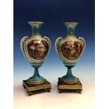 A PAIR OF SEVRES STYLE TURQUOISE GROUND BALUSTER VASES, EACH WITH JEWELLED FRAMED RESERVES OF