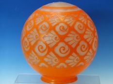 AN ART DECO ORANGE OVERLAY GLASS SPHERICAL SHADE, THE DIAMOND DIAPER CUTTING FILLED WITH STYLISED