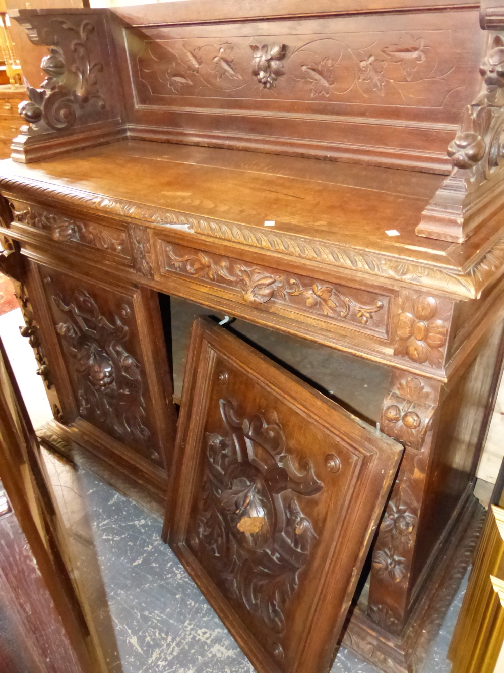 A LARGE FRENCH CARVED OAK SIDE CABINET. - Image 2 of 2