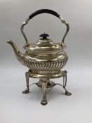 A VICTORIAN SILVER HALLMARKED TEAPOT AND TEA KETTLE STAND WITH BURNER. THE TEA KETTLE IS DATED