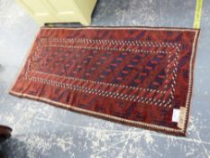 AN ANTIQUE BELOUCH RUG, 222 x 109cms