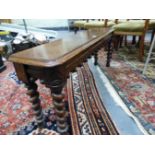 A CARVED OAK VICTORIAN AND LATER WINDOW/HALL SEAT, SPIRAL TWIST LEGS W 122cms