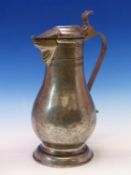 A LATE 18th/EARLY19th CENTURY PEWTER BALUSTER FLAGON, THE HINGED LID WITH A HEART SHAPE COVERING THE