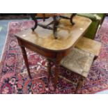 A GEORGE III MAHOGANY SIDE TABLE, THE RECTANGULAR TOP WITH ROUNDED FRONT OVER REEDED TAPERING