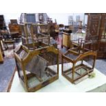 TWO VINTAGE ORNAMENTAL WOOD AND WIRE BIRD CAGES. LARGEST 36 x 83 x 22cms.