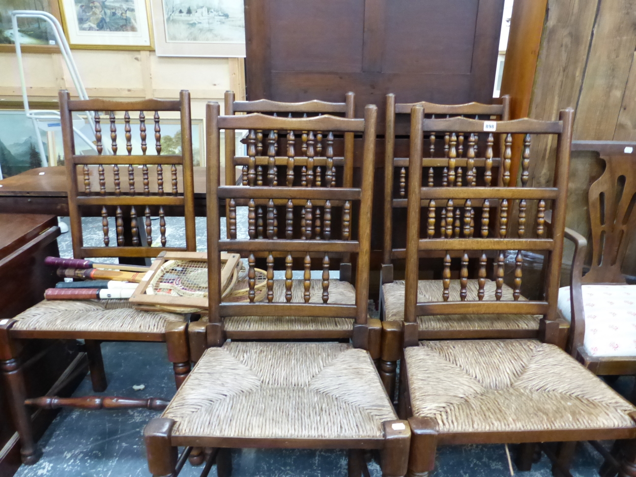 A SET OF FIVE RUSH SEAT SPINDLE BACK SIDE CHAIRS.