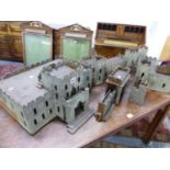 AN EARLY 20th C. ANGLO-INDIAN GREY COATED PLYWOOD MODEL FORT WITH CASTELLATED WALLS AND SIX TURRETS