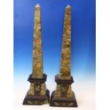 A PAIR OF VICTORIAN PINK AND GREY MOTTLED STONE OBELISKS INCISED AND GILT WITH EGYPTIAN MOTIFS, THE
