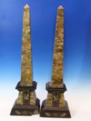 A PAIR OF VICTORIAN PINK AND GREY MOTTLED STONE OBELISKS INCISED AND GILT WITH EGYPTIAN MOTIFS, THE