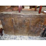 A TWO HANDLED CANVAS COVERED PINE CHEST THE LID AND SIDES BOUND BY IRON STRAPS. W 106 x D 61 x H