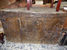 A TWO HANDLED CANVAS COVERED PINE CHEST THE LID AND SIDES BOUND BY IRON STRAPS. W 106 x D 61 x H