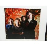 •TOM SHEEHAN. ARR. THE VERVE, EARLY SHOT. SIGNED COLOUR PHOTOGRAPHIC PRINT, 46 x 46cms.