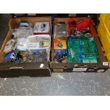 A COLLECTION OF VINTAGE ELECTRONIC CIRCUIT BOARDS, DIODES RESISTORS, AND OTHER COMPONENTS.