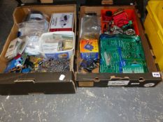 A COLLECTION OF VINTAGE ELECTRONIC CIRCUIT BOARDS, DIODES RESISTORS, AND OTHER COMPONENTS.