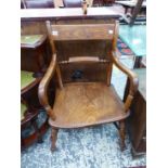 A VICTORIAN OXFORD ARM CHAIR.