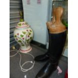 A PAIR OF RIDING BOOTS AND A LARGE TABLE LAMP
