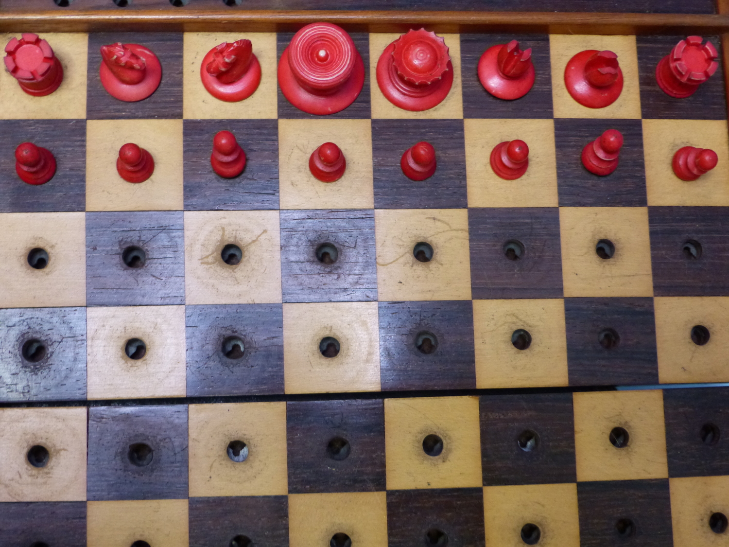 A JAQUES TRAVELLERS CHESS SET, THE MAHOGANY BOARD WITH LOCKS TO HOLD THE RED AND WHITE PIECES IN - Image 9 of 16