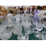 A QUANTITY OF VARIOUS GLASSWARE'S INCLUDING DECANTERS, VASES, BOWLS, AND A POTTERY ORIENTAL GINGER