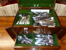 AN OAK CANTEEN CONTAINING VARIOUS CUTLERY.