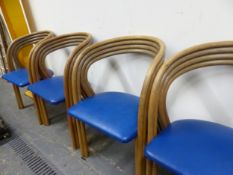 A SET OF SIX 20th C. BENTWOOD ELBOW CHAIRS, THE FOUR CURVED BARS FORMING THE CURVED BACKS AND ARMS