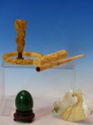 A DESK SEAL WITH FLORAL CARVED HANDLE, A MALACHITE EGG, A MOTHER OF PEARL BOUND NOTE PAD, A