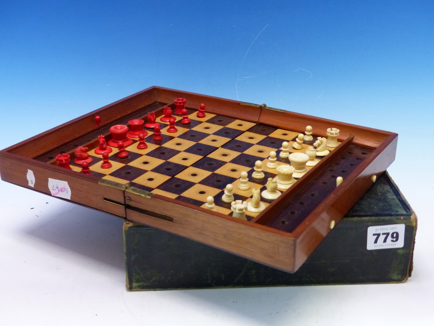 A JAQUES TRAVELLERS CHESS SET, THE MAHOGANY BOARD WITH LOCKS TO HOLD THE RED AND WHITE PIECES IN - Image 2 of 16