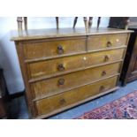 A 19th C. OAK CHEST OF TWO SHORT AND THREE GRADED LONG DRAWERS EACH WITH IRON RING HANDLES. W 118