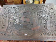 AN EARLY 20th C. CHINESE HARDWOOD TABLE TOP ON FOLDING STAND CARVED IN RELIEF WITH FIGURES IN A