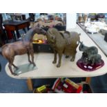 A INTERNATIONAL JUMPING LEISELE 1998 LEATHER HORSE FIGURE, A PAST TIMES TANG TYPE HORSE AND A TWO