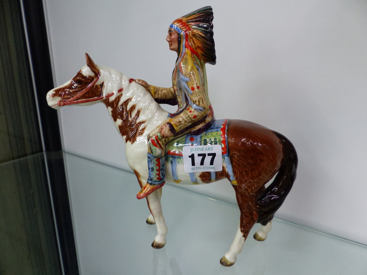 A BESWICK FIGURINE INDIAN ON HORSE BACK