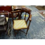 AN EDWARDIAN INLAID CORNER ARM CHAIR.