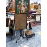 AN ANTIQUE MAHOGANY POLE SCREEN TOGETHER WITH A FIRESCREEN AND A SET OF BELLOWS.