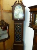 A WESTERN GERMAN OAK LONG CASED CLOCK, THE SILVER DIAL WITH A MOON PHASE ARC IN THE ARCH ABOVE A