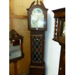 A WESTERN GERMAN OAK LONG CASED CLOCK, THE SILVER DIAL WITH A MOON PHASE ARC IN THE ARCH ABOVE A