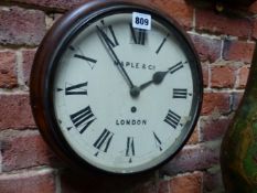 A MAPLE & CO. MAHOGANY FRAMED WALL CLOCK WITH PAINTED DIAL. Dia. 30cms.