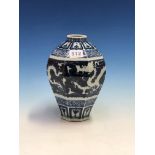 A CHINESE BLUE AND WHITE VASE, POSSIBLY LATE MING, THE OVOID SHAPE OF OCTAGONAL SECTION, INCISED AND
