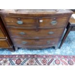 A SMALL 19th CENTURY MAHOGANY BOW FRONT CHEST OF DRAWERS.