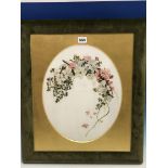 A FRAMED MILK GLASS OVAL PAINTED IN OILS BY MAY Wms. WITH AN ARCHED BUNCH OF FLOWERS, THE GREEN