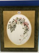 A FRAMED MILK GLASS OVAL PAINTED IN OILS BY MAY Wms. WITH AN ARCHED BUNCH OF FLOWERS, THE GREEN