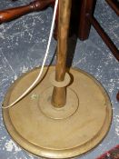 A BRASS STANDARD LAMP.