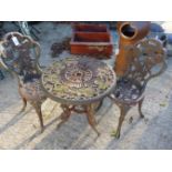 SMALL CAST IRON GARDEN TABLE AND TWO CHAIRS