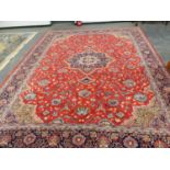 A PERSIAN KASHAN CARPET, 433 x 319cms