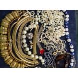A COLLECTION OF COSTUME JEWELLERY AND VARIOUS STRANDS OF CULTURED AND OTHER PEARLS ETC